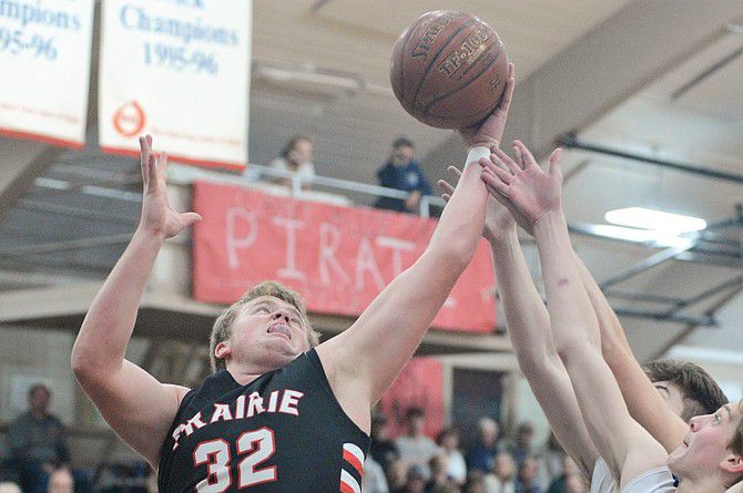 Prairie's Schumacher rebounds during the Idaho County Shootout